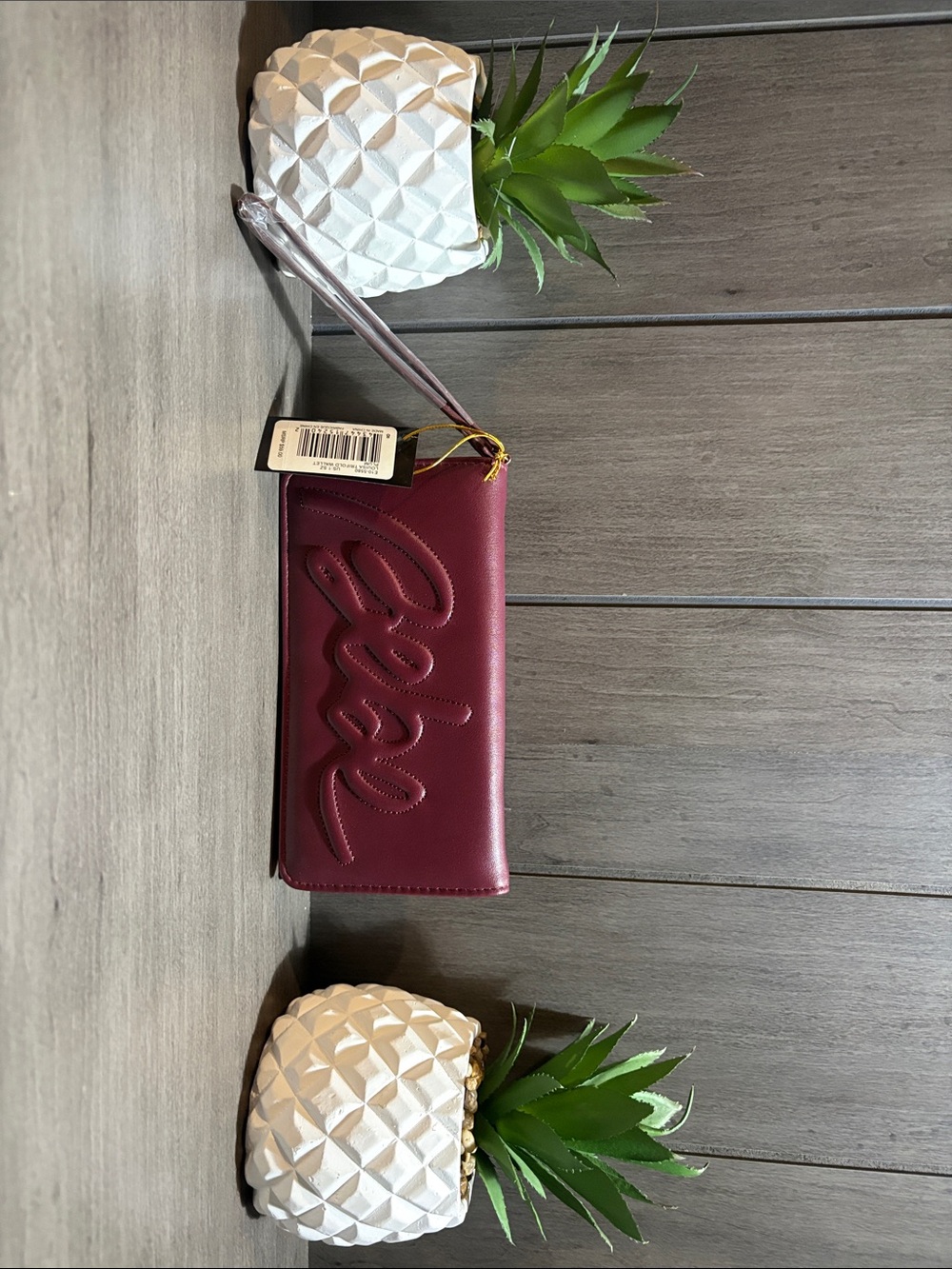 bebe Burgundy Wristlet Clutch with Embossed Logo